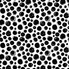 Seamless pattern with hand drawn black circles. Ink illustration. Ornament for wrapping paper. Monochrome design. Isolated on white background. 