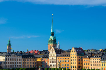 Fototapeta premium Traditional buildings with roofs and colorful walls, Stockholm, Sweden