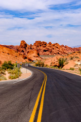Fototapeta na wymiar Highway winds through the Nevada Desert