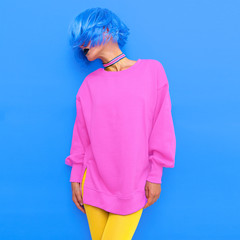 Life is colorful. Fashion model with blue hair and bright look