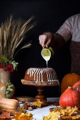 Fototapeta premium homemade pumpkin bundt cake with creamy frosting