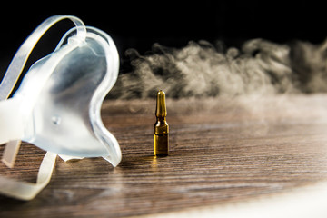 Steam mist from Nebulizer or nebuliser electrical machine drug delivery device used to administer...