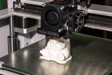 Electronic three dimensional plastic printer during work , 3D printer.