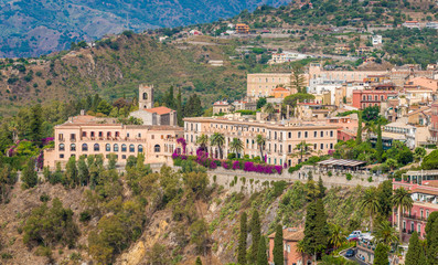Fototapeta premium Panoramic sight from the Ancient Greek Theater in Taormina. Province of Messina, Sicily, southern Italy.