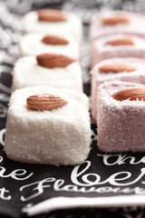 Two lines of a rahat lokum with almonds