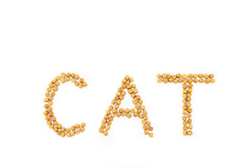 dried pet food in the shape of note cat on white background. Isolated on white