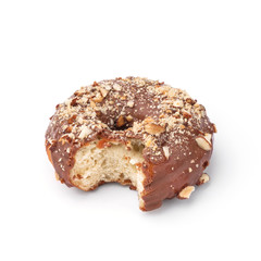 Glazed donut with milk chocolate and nutmeg. View from a forty-five degree angle. Isolated image. The side-bite donut.