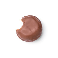 Donut glazed with milk chocolate. Top view. Isolated image. The side-bite donut.