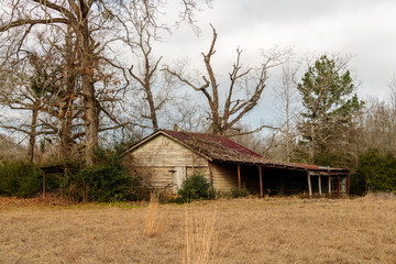 old barn in field