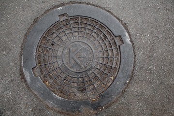old manhole cover
