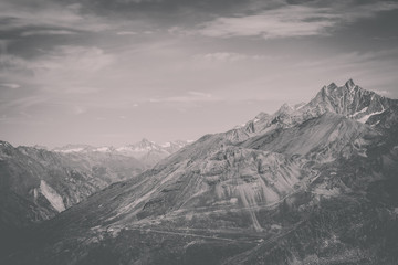 View closeup mountains scenes in national park Zermatt, Switzerland, Europe. Summer landscape, sunshine weather, dramatic blue sky and sunny day