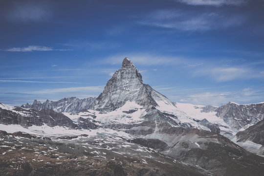 View closeup Matterhorn mountain, scenes in national park Zermatt, Switzerland, Europe. Summer landscape, sunshine weather, dramatic blue sky and sunny day. Print poster, image, photo, picture