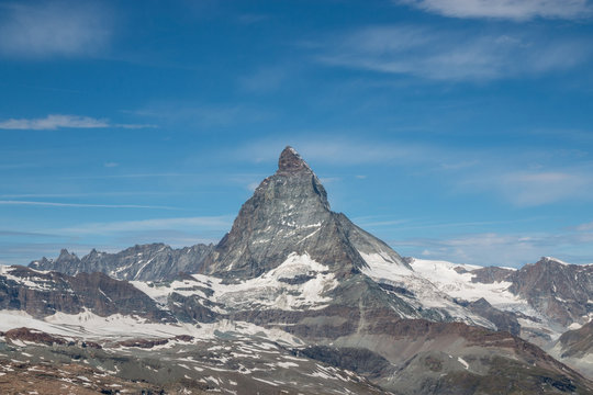 View closeup Matterhorn mountain, scenes in national park Zermatt, Switzerland, Europe. Summer landscape, sunshine weather, dramatic blue sky and sunny day. Print poster, image, photo, picture