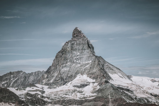 View closeup Matterhorn mountain, scenes in national park Zermatt, Switzerland, Europe. Summer landscape, sunshine weather, dramatic blue sky and sunny day. Print poster, image, photo, picture