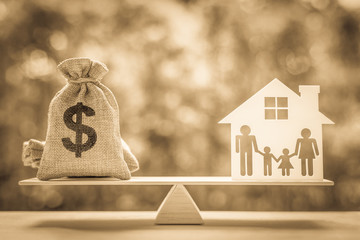 Legacy / inheritance or death tax concept : US dollar bag, a house and family members e.g father,...