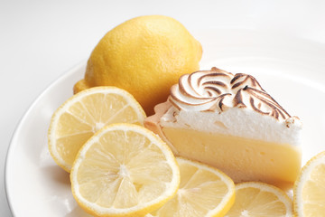 Lemon cheese tart on white background - Soft Focus