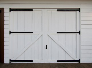 White wooden barn doors with black hinges