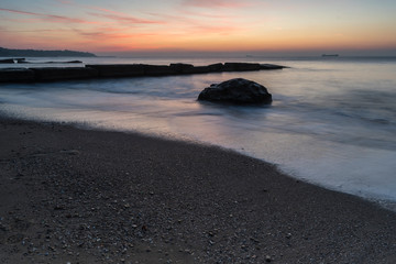 Meeting the sunrise on the beach.