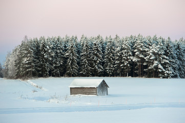 Barn in the snowy landscape