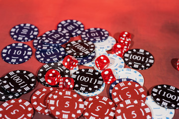Casino abstract photo. Poker game on red background. Theme of gambling