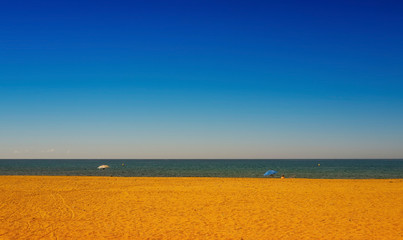 Yellow sandy beach and sea