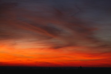 Fiery orange sunset sky. Beautiful sky. Natural background