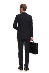 back view of young blonde businessman waiting for job interview