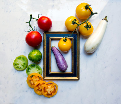 Various organic vegetables with picture frame