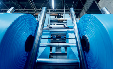 Modern automated production line in factory. Plastic bag manufacturing process