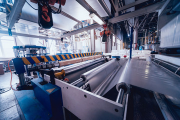 Modern automated production line in factory. Plastic bag manufacturing process