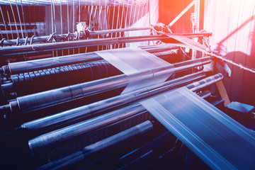 Modern automated production line in factory. Plastic bag manufacturing process