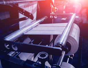 Modern automated production line in factory. Plastic bag manufacturing process