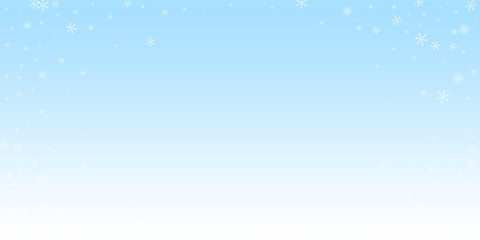 Sparse glowing snow Christmas background. Subtle f