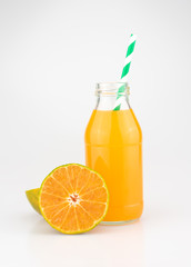 Pure Orange Juice Extract with Fresh Slice Orange Fruit Refreshment Juicy in Glass Bottle on White Background