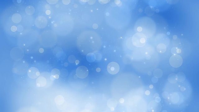 Beautiful blue colored blurry circle bokeh motion background. Christmas and New Year copy space decoration animation. 