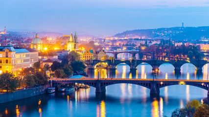 Fototapeta na wymiar Prague bridges over Vltava River in the evening, Praha, Czech Republic