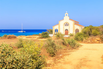 View of a church near the sea on shore near Protaras, Cyprus