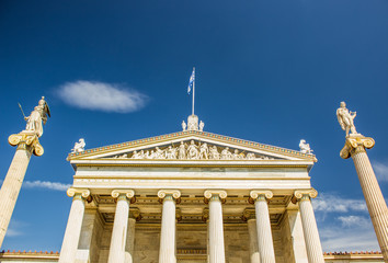 symmetry ancient palace facade from below foreshortening, Rome architecture, empty space on contrast blue empty sky