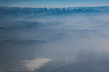 Caucasus panorama with white cloud field