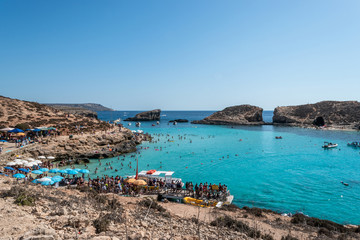 Blue Lagoon - Island of Comino - Malta. The Blue Lagoon on the tiny island of Comino with Gozo in the distance. Malta 20th august 2016 Comino Malta