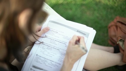 The girl fills the gaps in the task