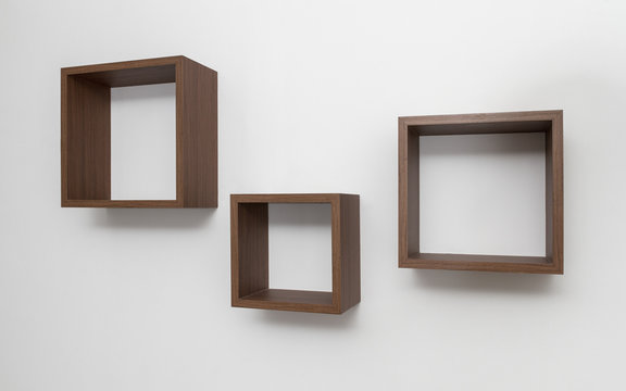 Wooden Shelves set on white wall