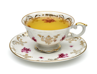 Green tea in cup with leaves on white background including clipping path