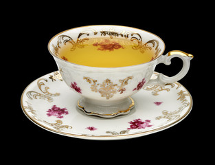 Green tea in cup with leaves on white background including clipping path