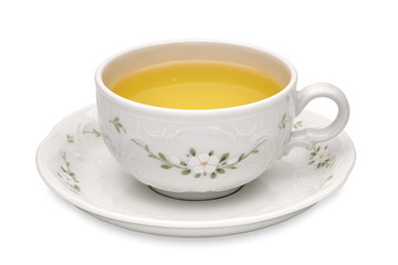 Green tea in cup with leaves on white background including clipping path