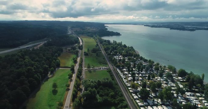 Drone aerial at Lake Constance and island Reichenau with pan to the left 4k