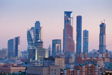 Fototapeta na wymiar Moscow skyline panorama, evening dusk aerial view to offices City skyscrapers 