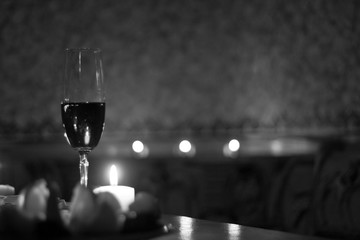 Red wine and candles - romantic evening.