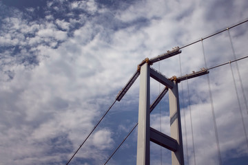 Close up view of Bosphorus bridge with cloudy sky background in Istanbul.