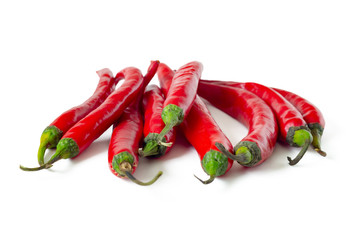Red chili pods with dried cuttings isolated on white background